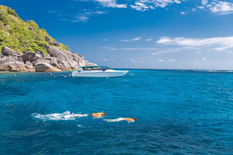 Rocky coastline at Similan Islands with turquoise waters and scenic surroundings.