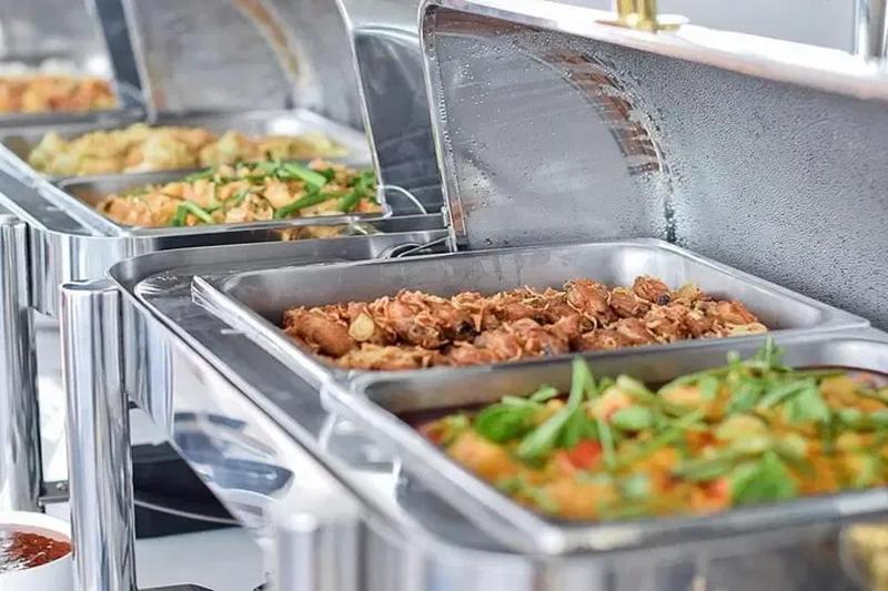 Delectable Thai cuisine buffet served on a luxury yacht for a premium dining experience while at sea